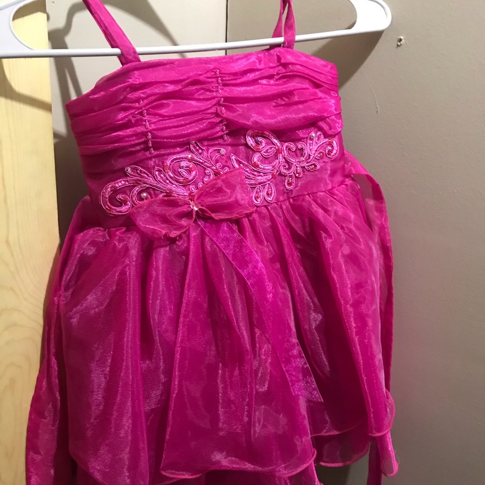 Pink dress with missing beads as shown left chest